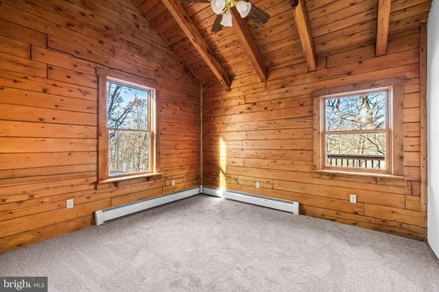 an empty room with windows