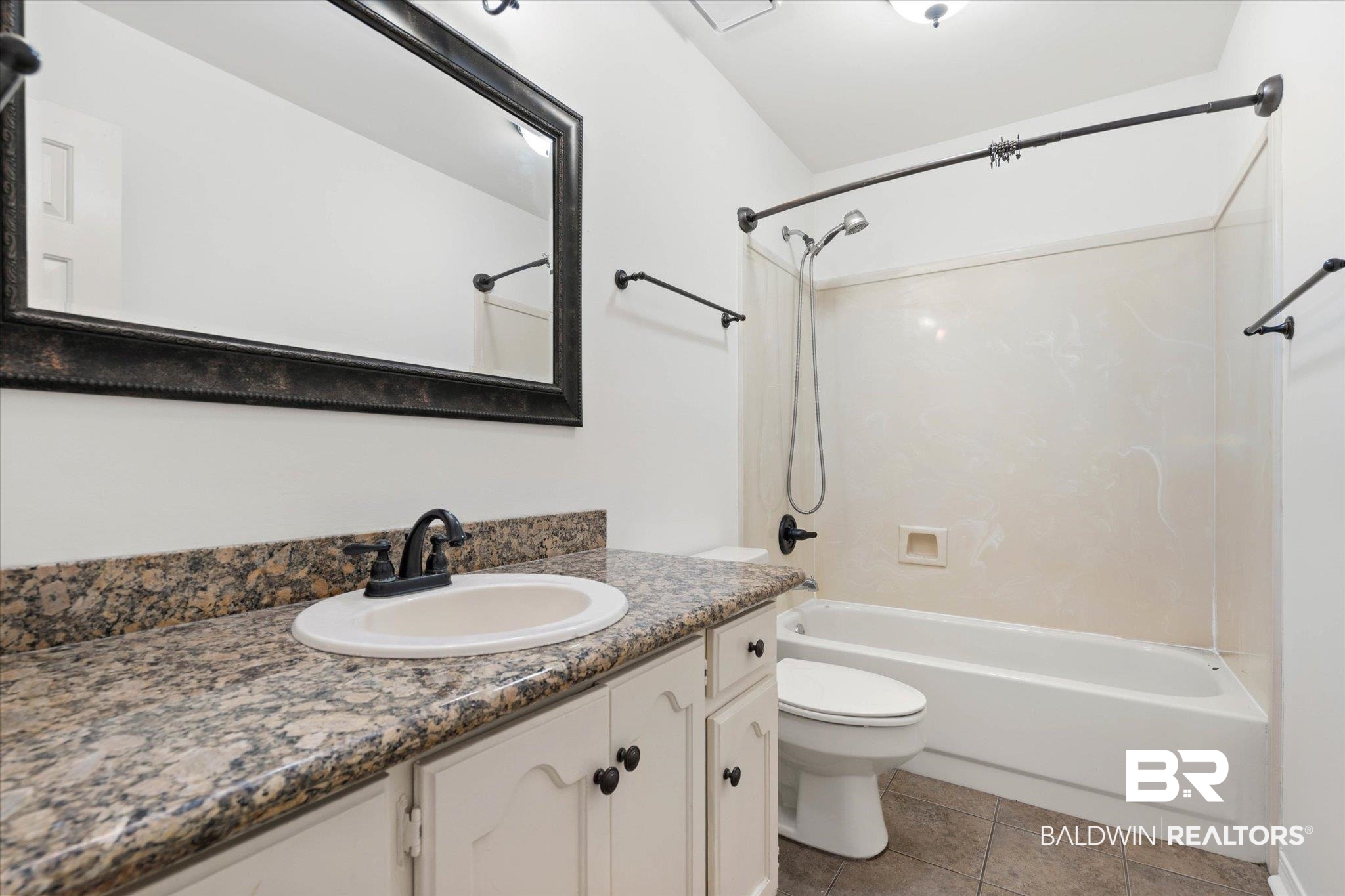 3032 Autumn Ridge Drive West Mobile, AL 36695 - Photo 15 of 20 Full bathroom with bathing tub / shower combination, vanity, and tile patterned flooring