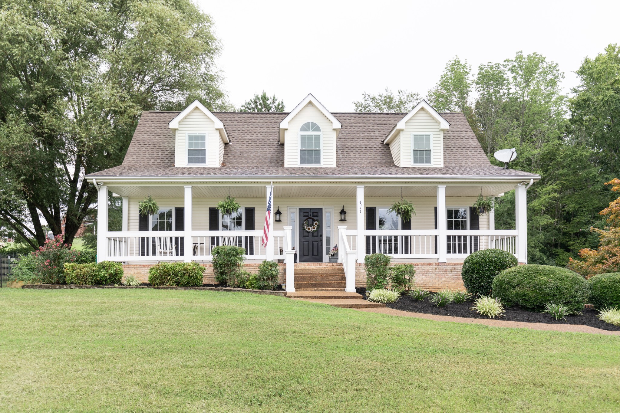 2071 Bradbury Road Adams, TN 37010 - Photo 3 of 47 a front view of a house with a yard