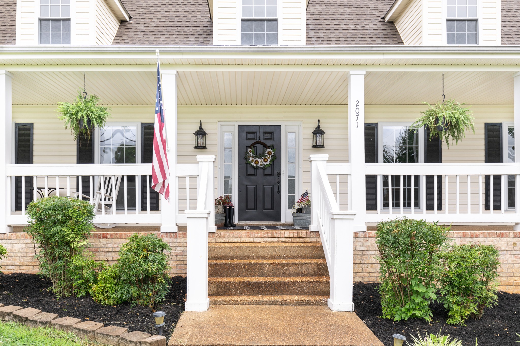 2071 Bradbury Road Adams, TN 37010 - Photo 5 of 47 a view of a house with large windows and plants
