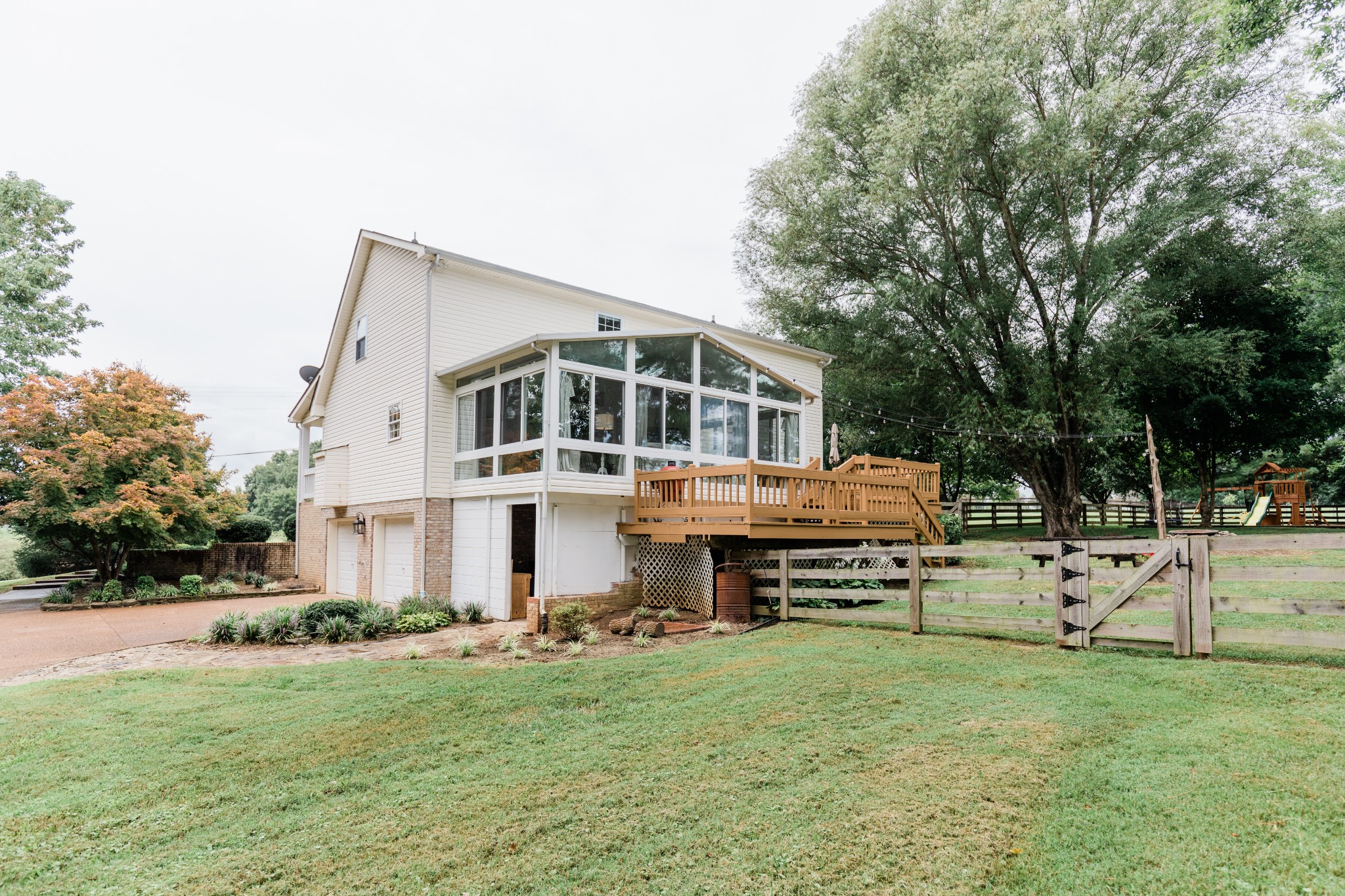 2071 Bradbury Road Adams, TN 37010 - Photo 44 of 47 a view of a house with backyard and sitting area
