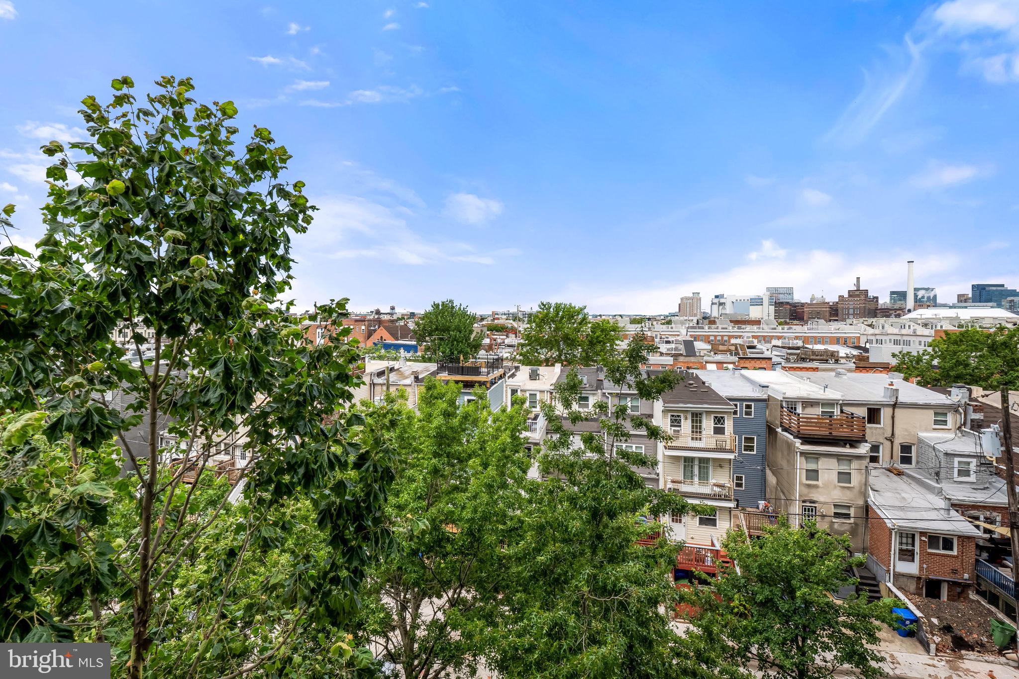 1200 Steuart Street, Unit 425 Baltimore, MD 21230 - Photo 19 of 33 a city view with tall buildings
