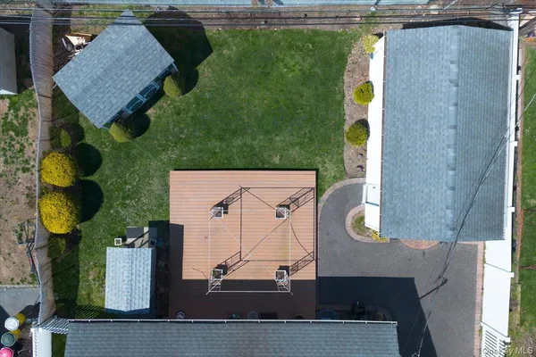 an aerial view of a house with swimming pool