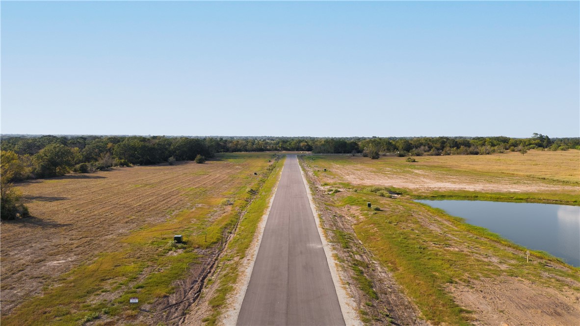 Tbd Tbd Plata Way Bryan, TX 77808 - Photo 14 of 28 a view of wooden floor and lake