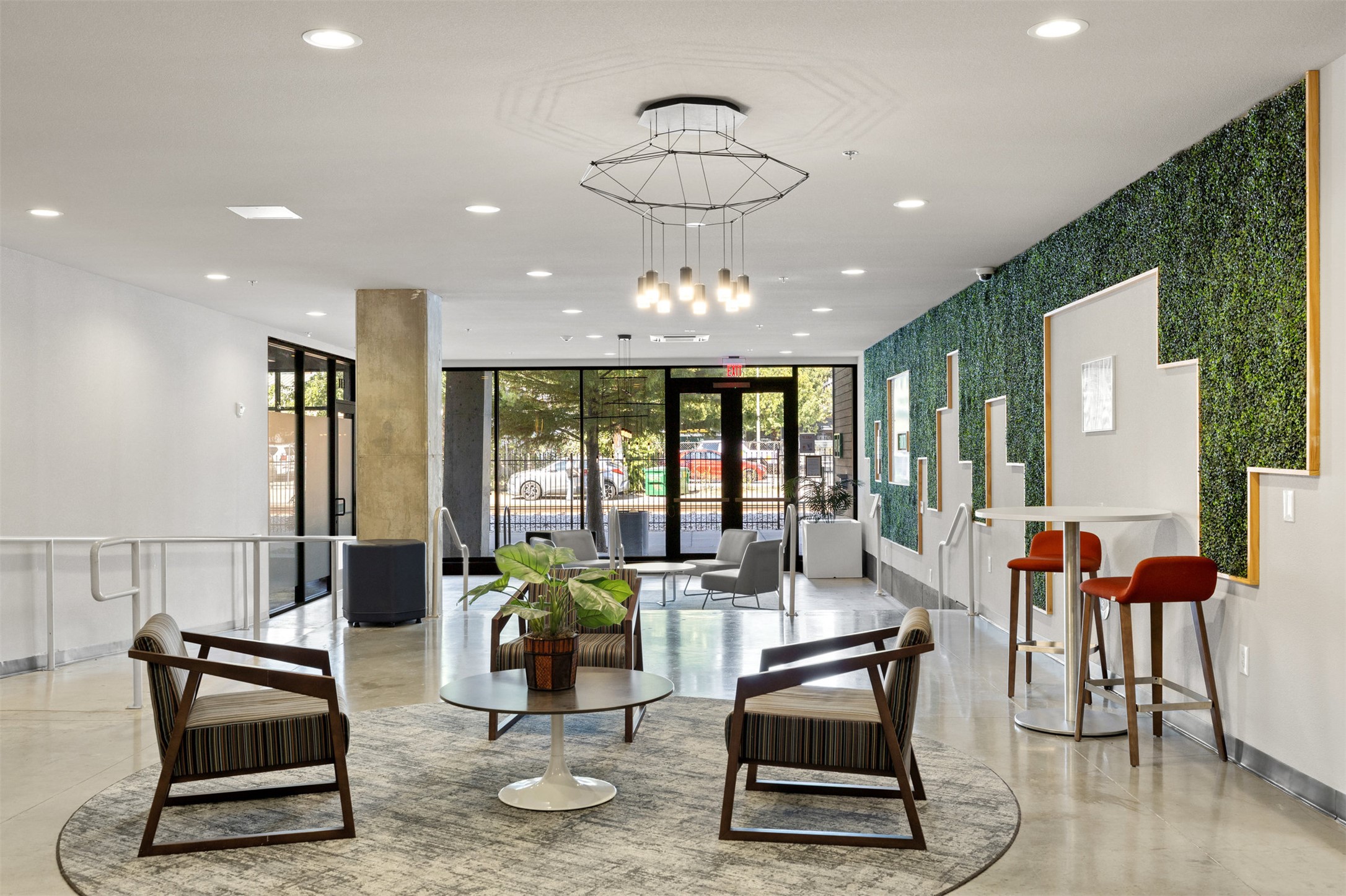 1800 East 4th Street, Unit 327 Austin, TX 78702 - Photo 9 of 20 a living room with furniture a wooden floor and next to a window