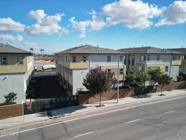 a view of a backyard of the house