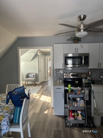 690 William Street Bridgeport, CT 06608 - Photo 10 of 25 Third Floor Kitchen area open to Living Room