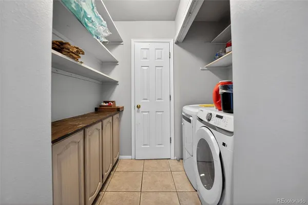 a view of an empty room with a bathroom