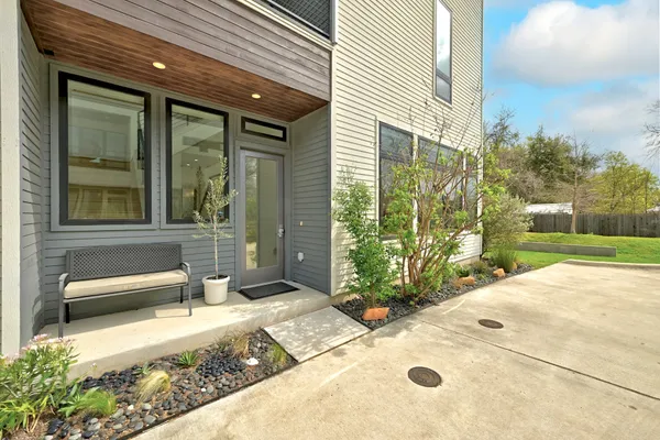 a front view of a house with a outdoor space