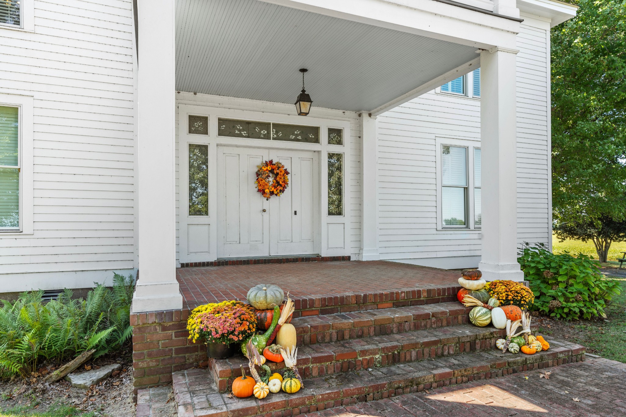 10587 Fulton Road Ripley, TN 38063 - Photo 2 of 29 a front view of a house with outdoor seating