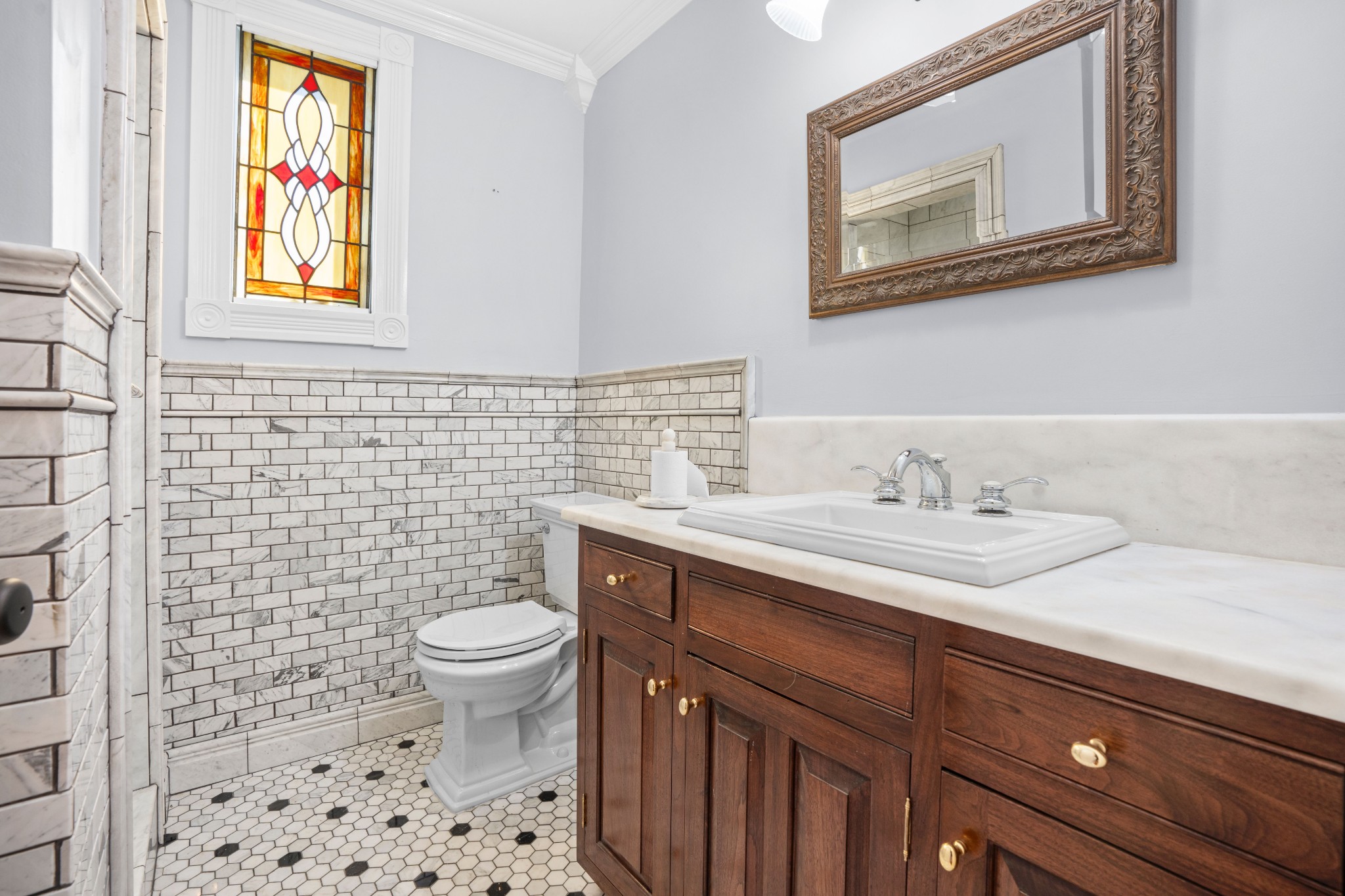 10587 Fulton Road Ripley, TN 38063 - Photo 22 of 29 a bathroom with a sink a toilet and a mirror