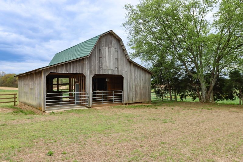 10587 Fulton Road Ripley, TN 38063 - Photo 25 of 29 a view of a house with a outdoor space