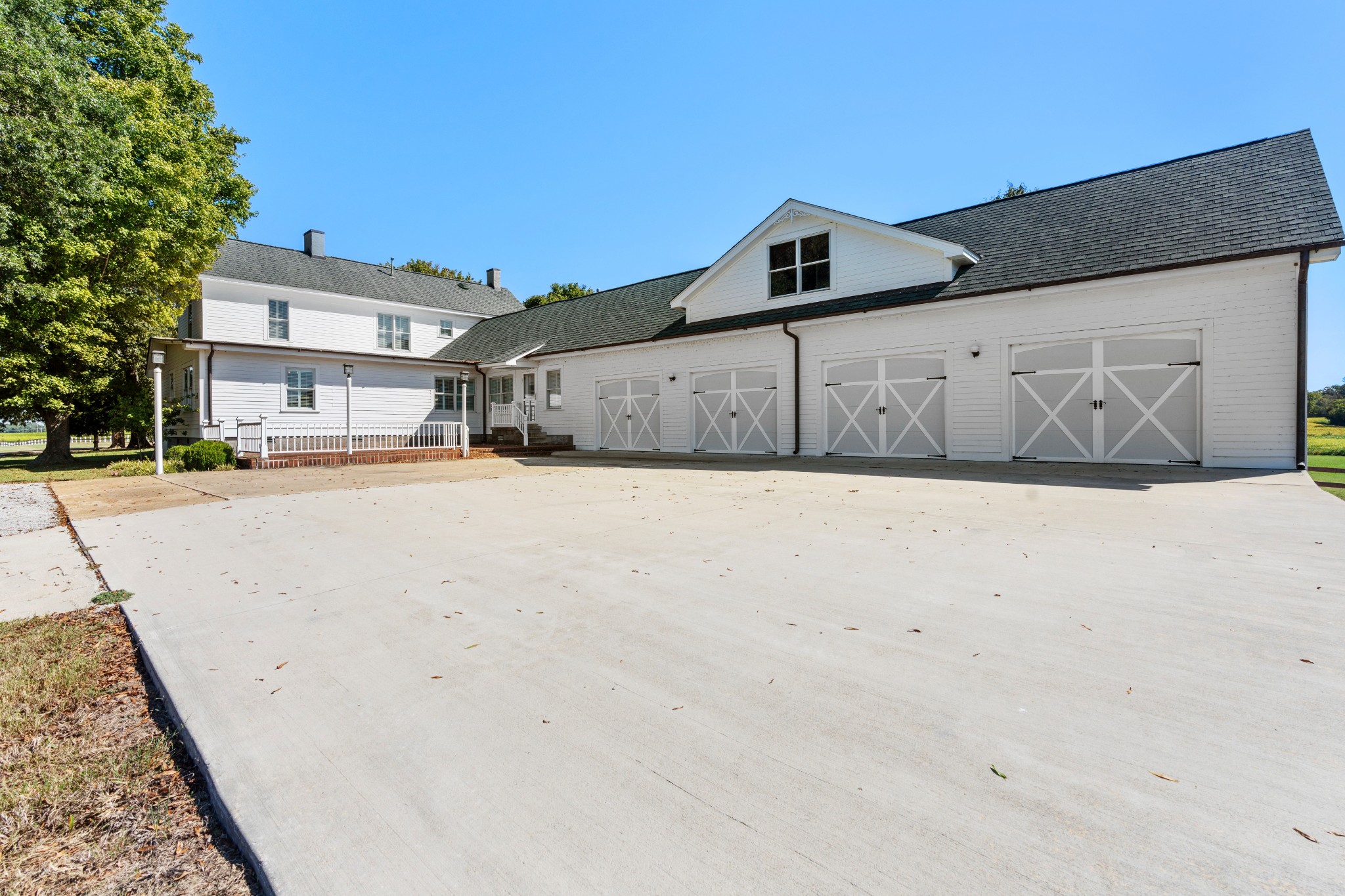 10587 Fulton Road Ripley, TN 38063 - Photo 6 of 29 a front view of a house with a yard
