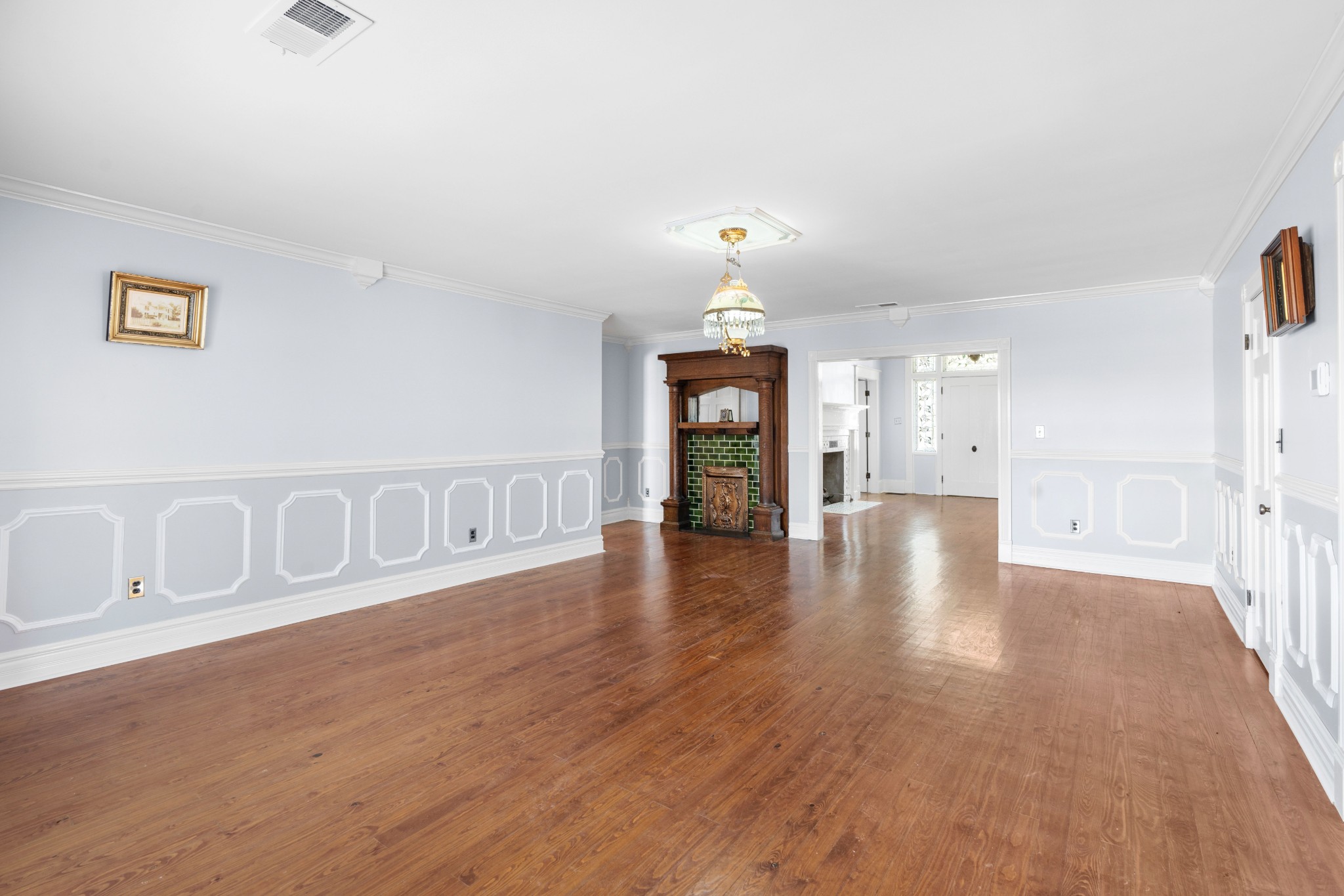 10587 Fulton Road Ripley, TN 38063 - Photo 8 of 29 a view of an empty room with window and wooden floor