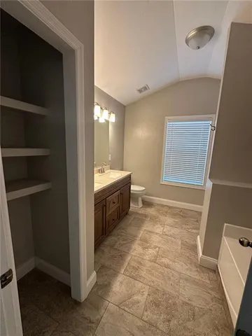 a view of a storage & utility room with two washing machine