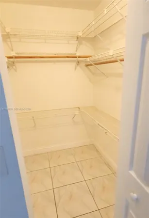 a bathroom with a close shower view