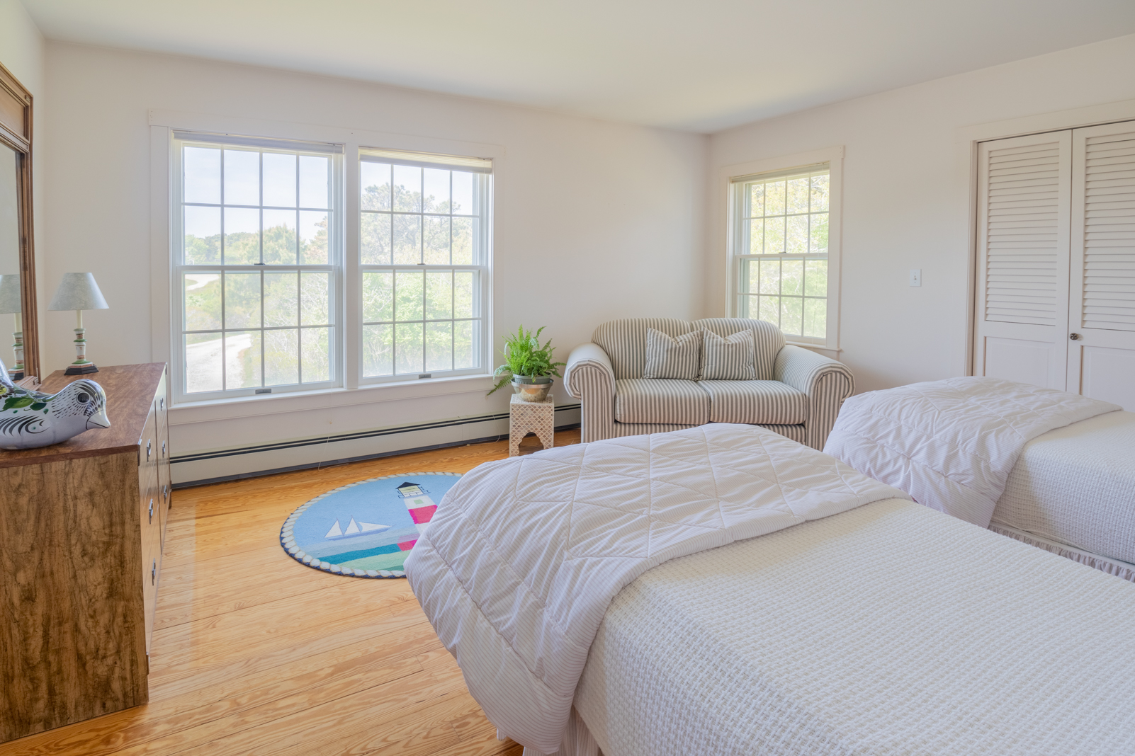 15 Swift Rock Road Nantucket, MA 02554 - Photo 16 of 32 a bedroom with a bed and a window