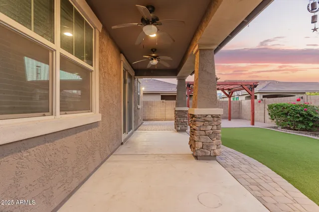 a view of a backyard of the house