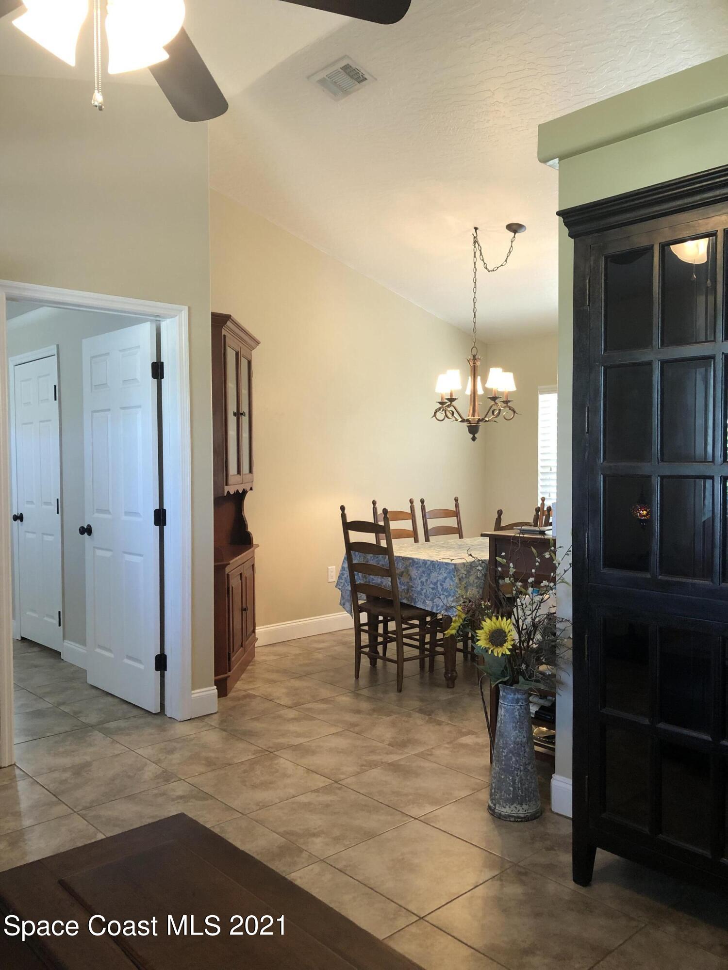 2865 Digby Road Southeast Palm Bay, FL 32909 - Photo 6 of 42 a view of a dining area with furniture