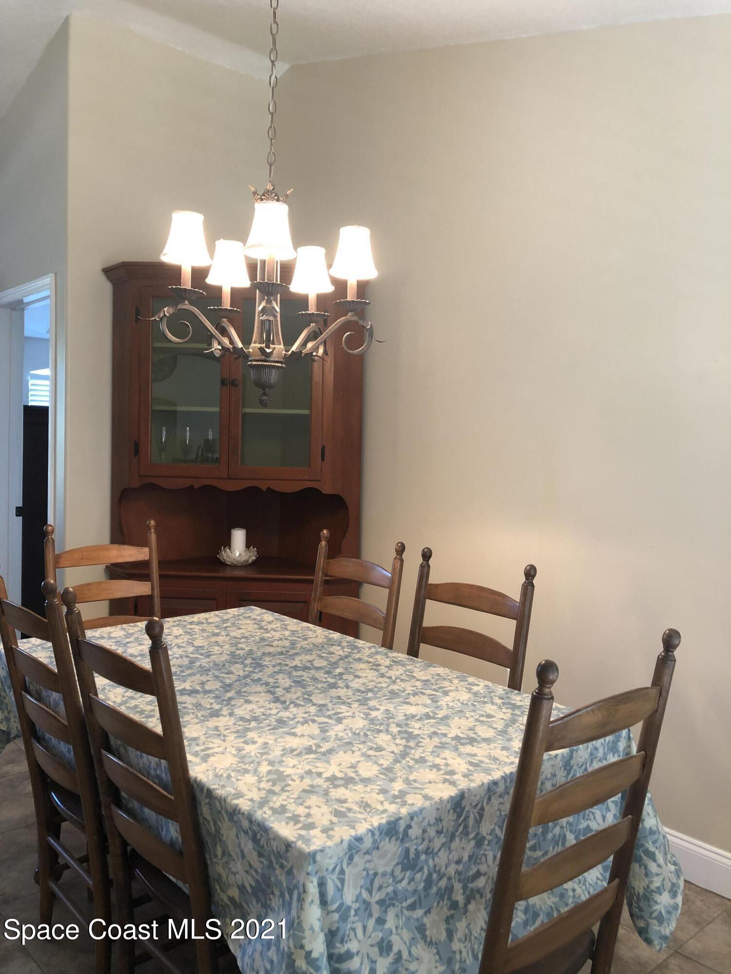2865 Digby Road Southeast Palm Bay, FL 32909 - Photo 8 of 42 a view of a dining room with furniture
