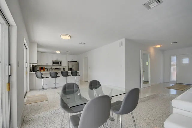 a house view with a garden space