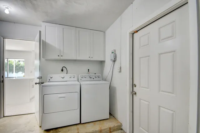 a backyard of a house with seating space