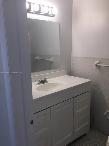 a kitchen with a stove and a microwave