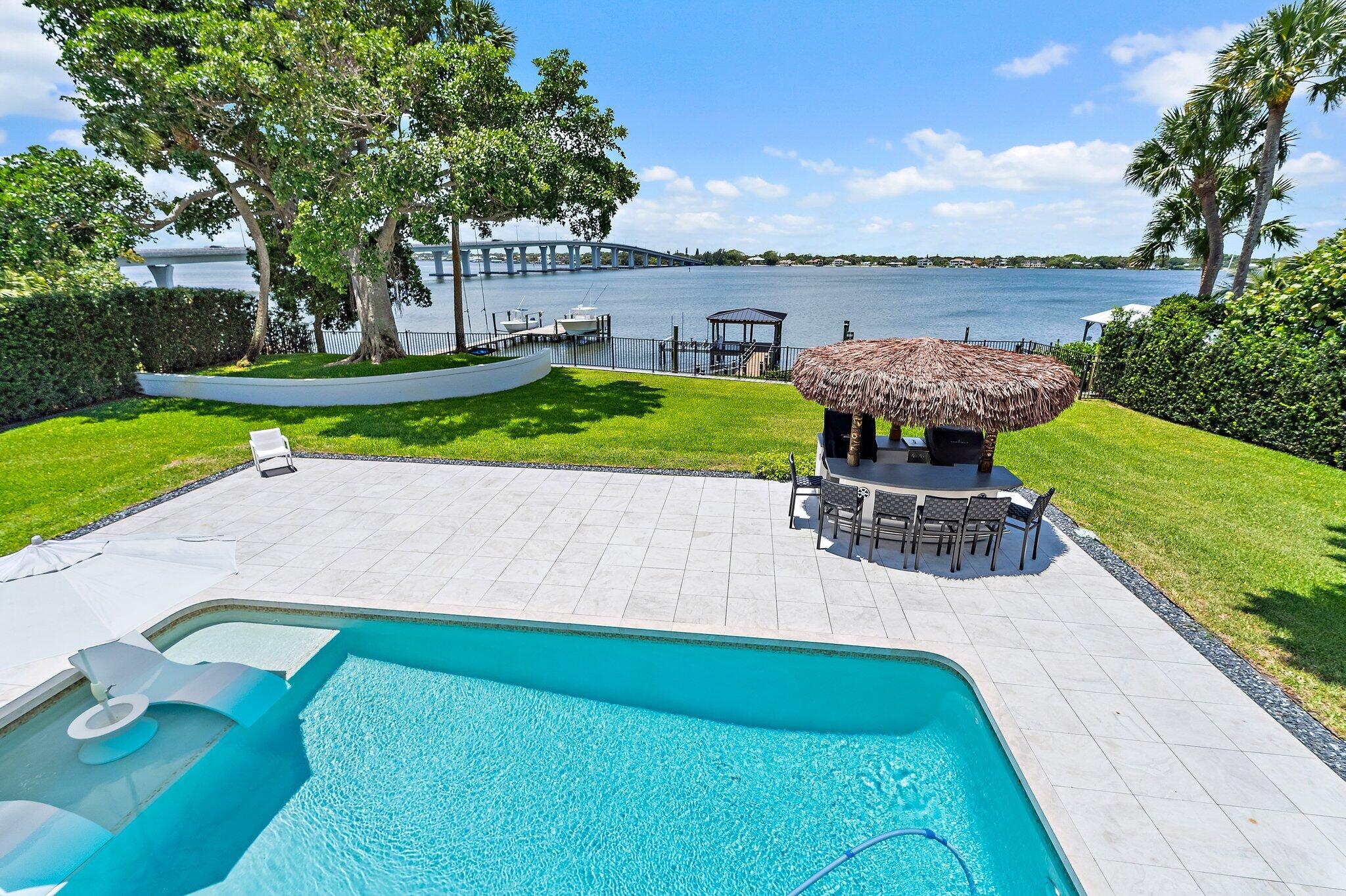 9 North River Road Stuart, FL 34996 - Photo 17 of 24 an aerial view of a house with outdoor space