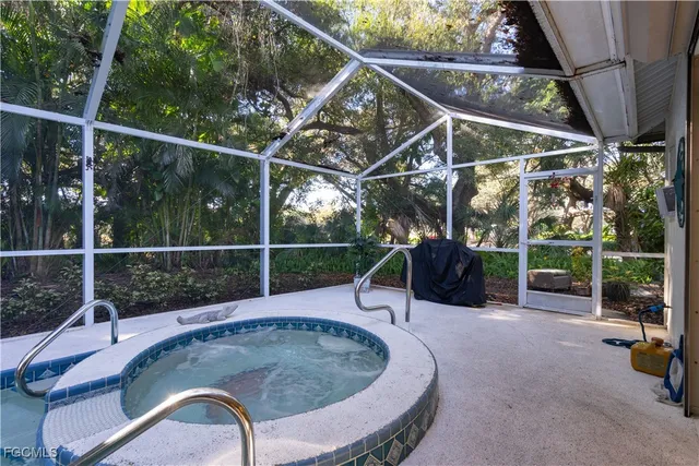 a view of a swimming pool with a patio