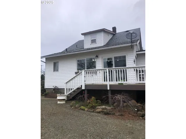 a view of a house with a roof deck
