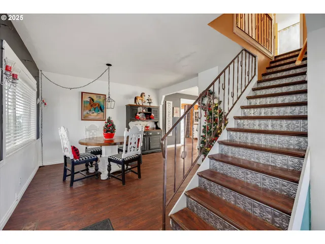 a kitchen with stainless steel appliances granite countertop a stove and a sink