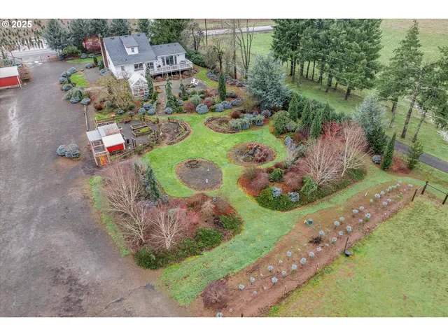 a aerial view of a house with a yard