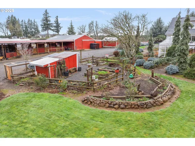 a aerial view of a house with swimming pool