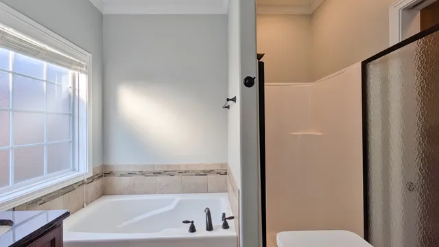 a bathroom with a bathtub