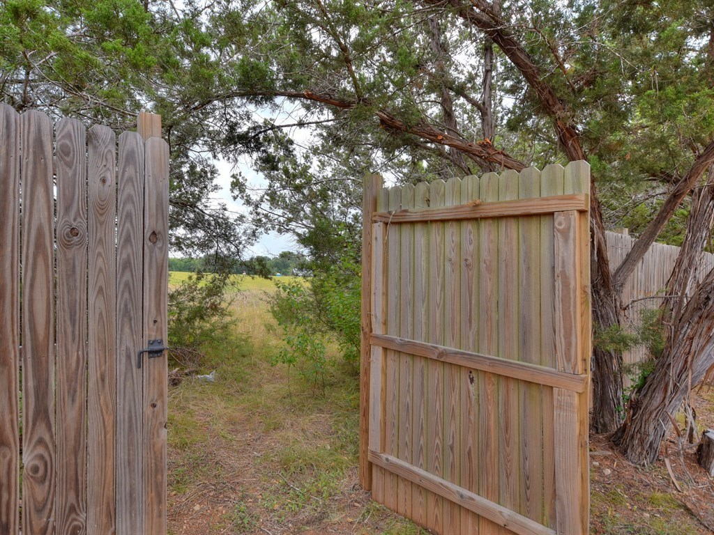 600 Grand Prairie Circle Dripping Springs, TX 78620 - Photo 3 of 29 The gate in your backyard leads directly to Founders Park with a playground, pool, hike & bike trails!
