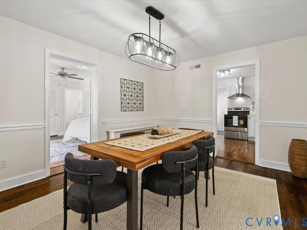 4803 Morrison Road Richmond, VA 23230 - Photo 13 of 45 a view of a dining room with furniture and wooden floor