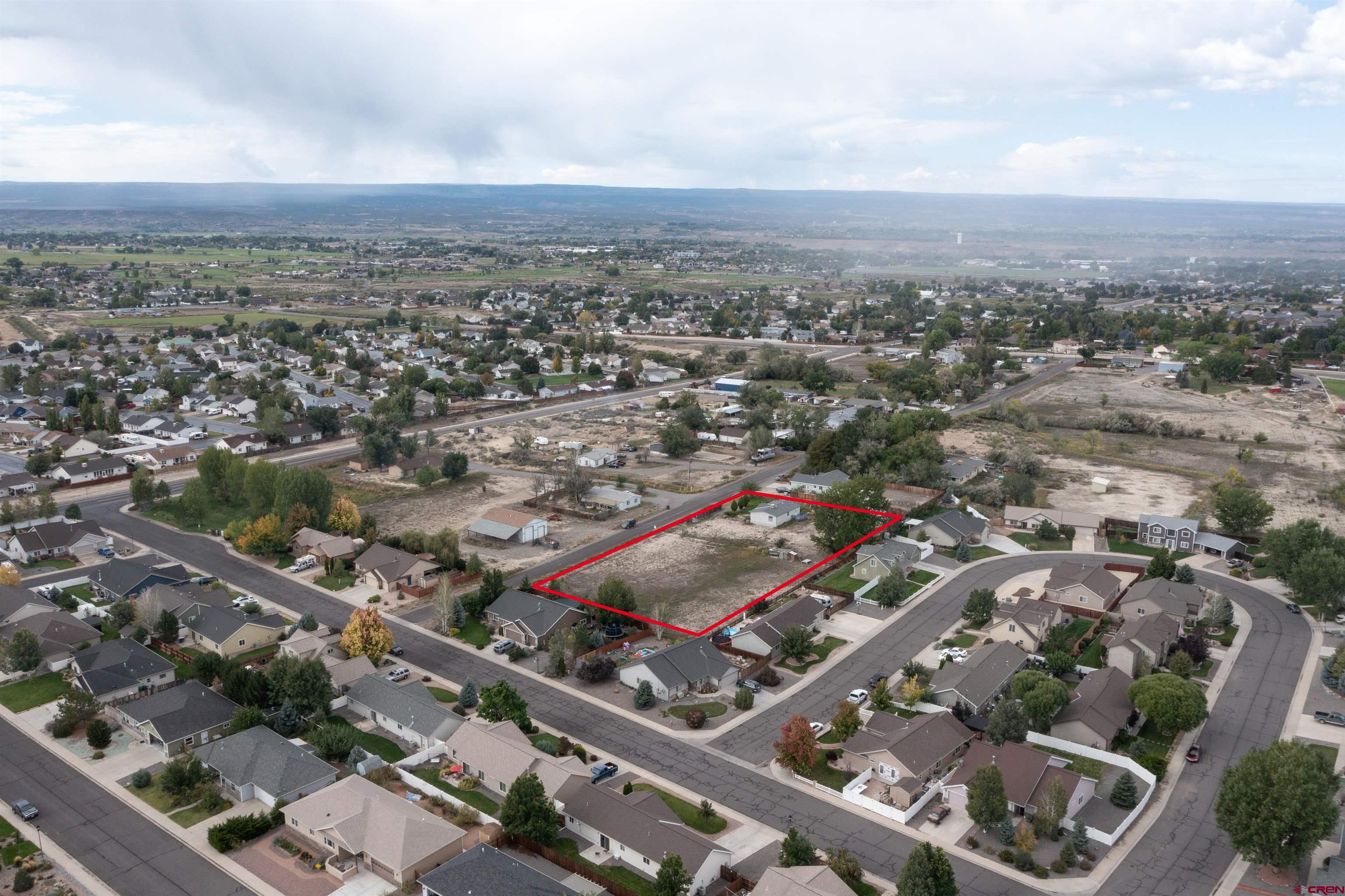 67135 N Road Montrose, CO 81401 - Photo 11 of 33 an aerial view of a city