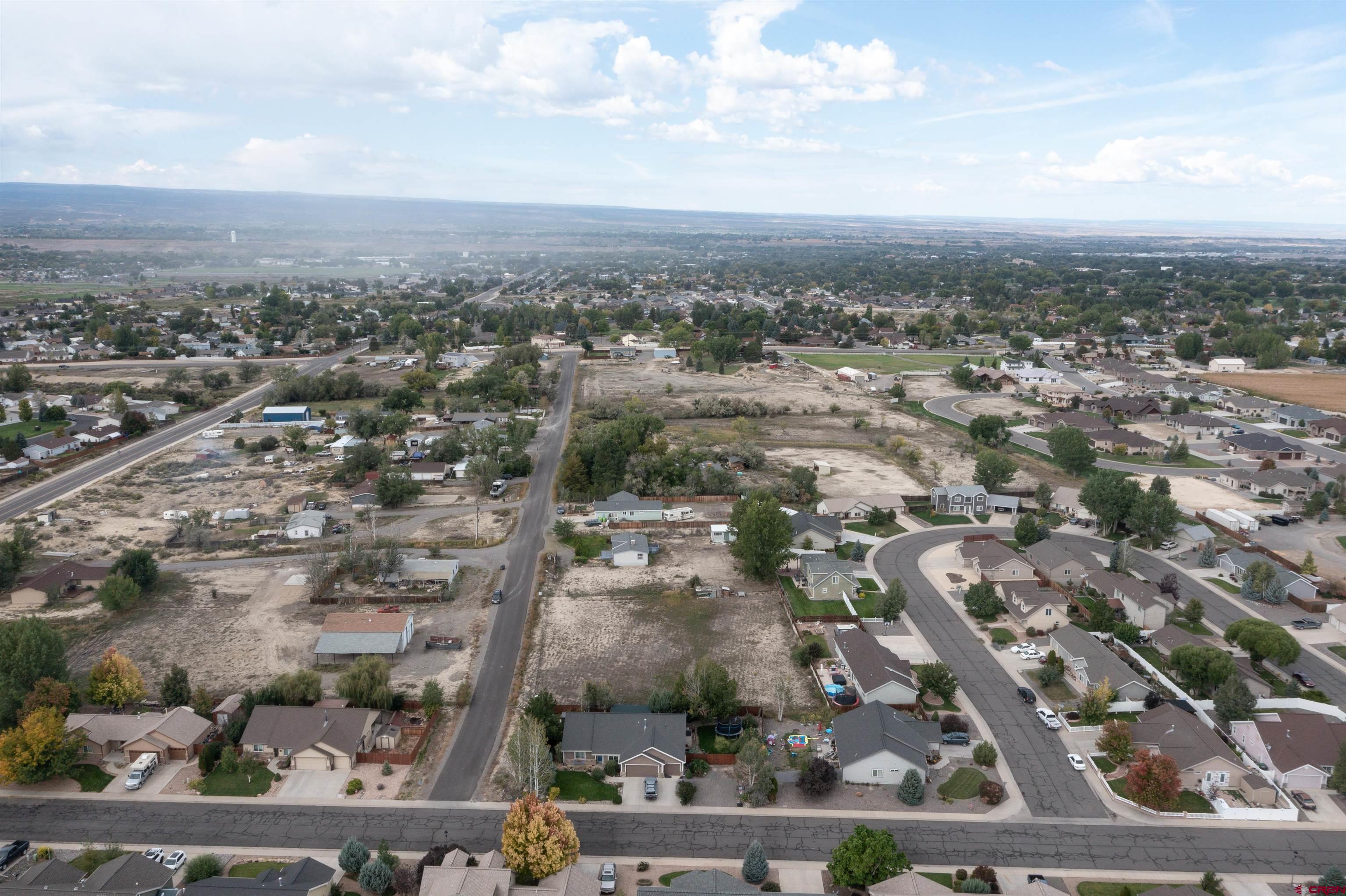 67135 N Road Montrose, CO 81401 - Photo 13 of 33 an aerial view of multiple house