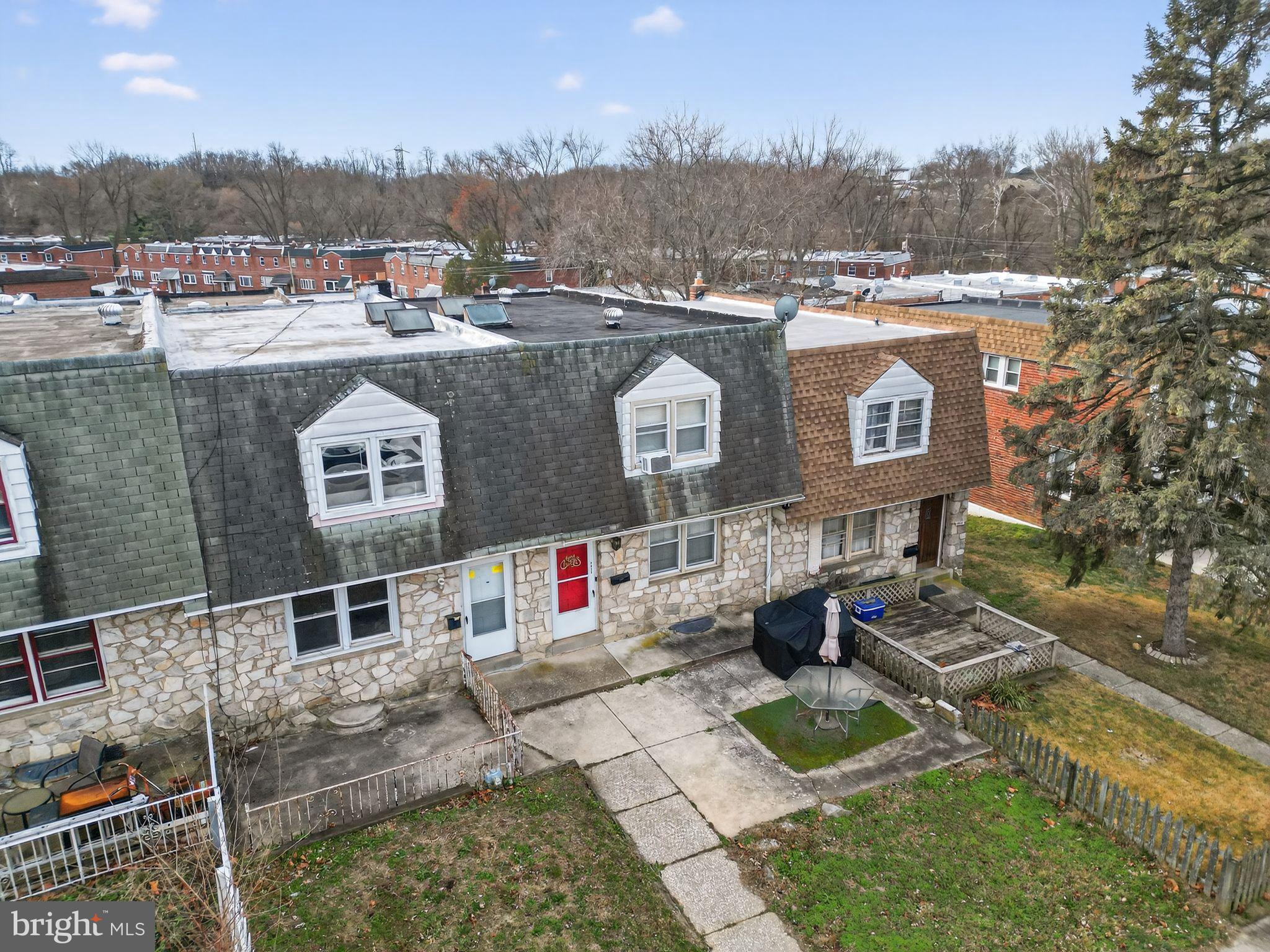 4026 Gideon Road Brookhaven, PA 19015 - Photo 17 of 28 a view of a house with a backyard and a patio