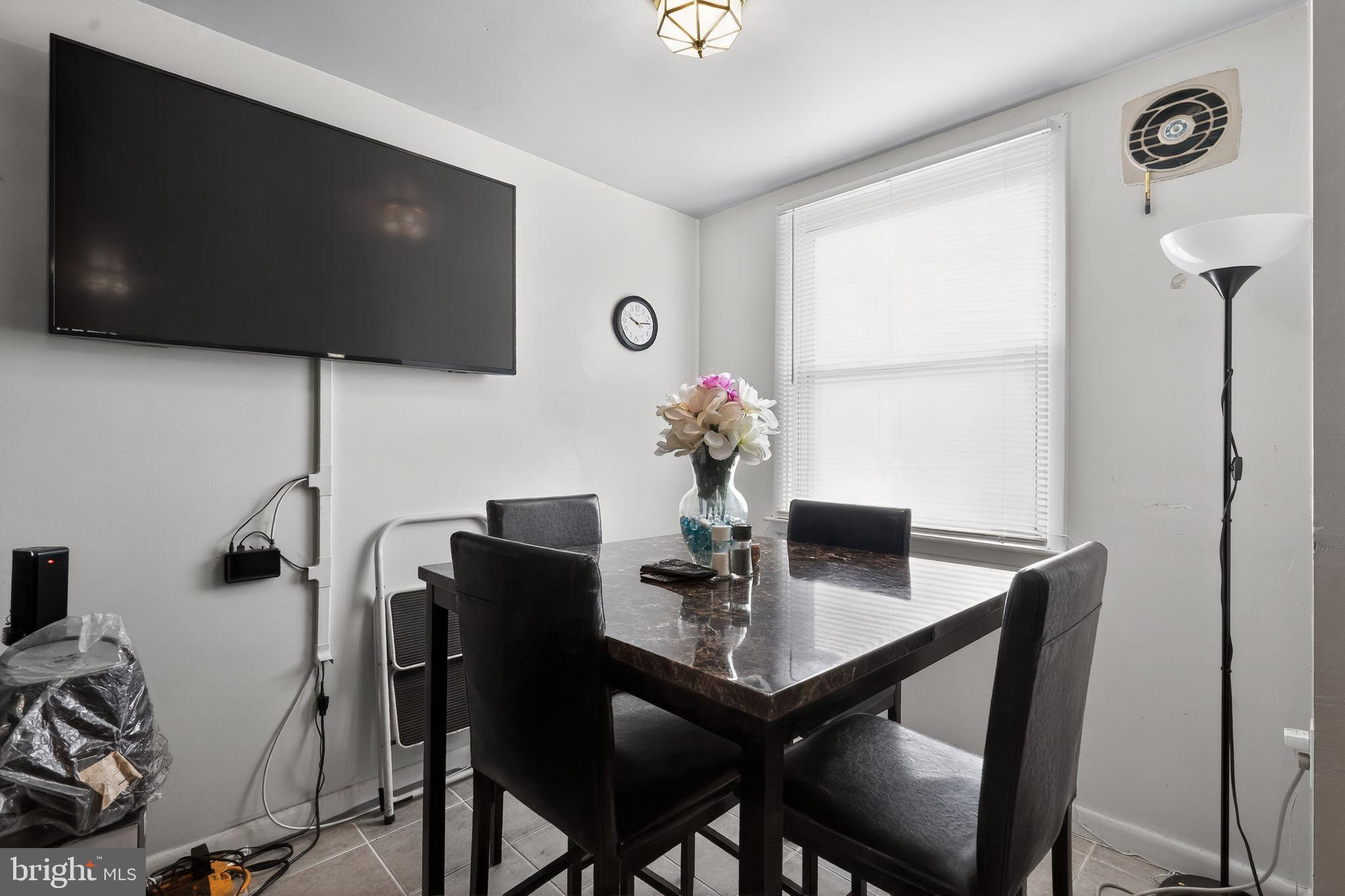 4026 Gideon Road Brookhaven, PA 19015 - Photo 3 of 28 a dining room with furniture and wooden floor