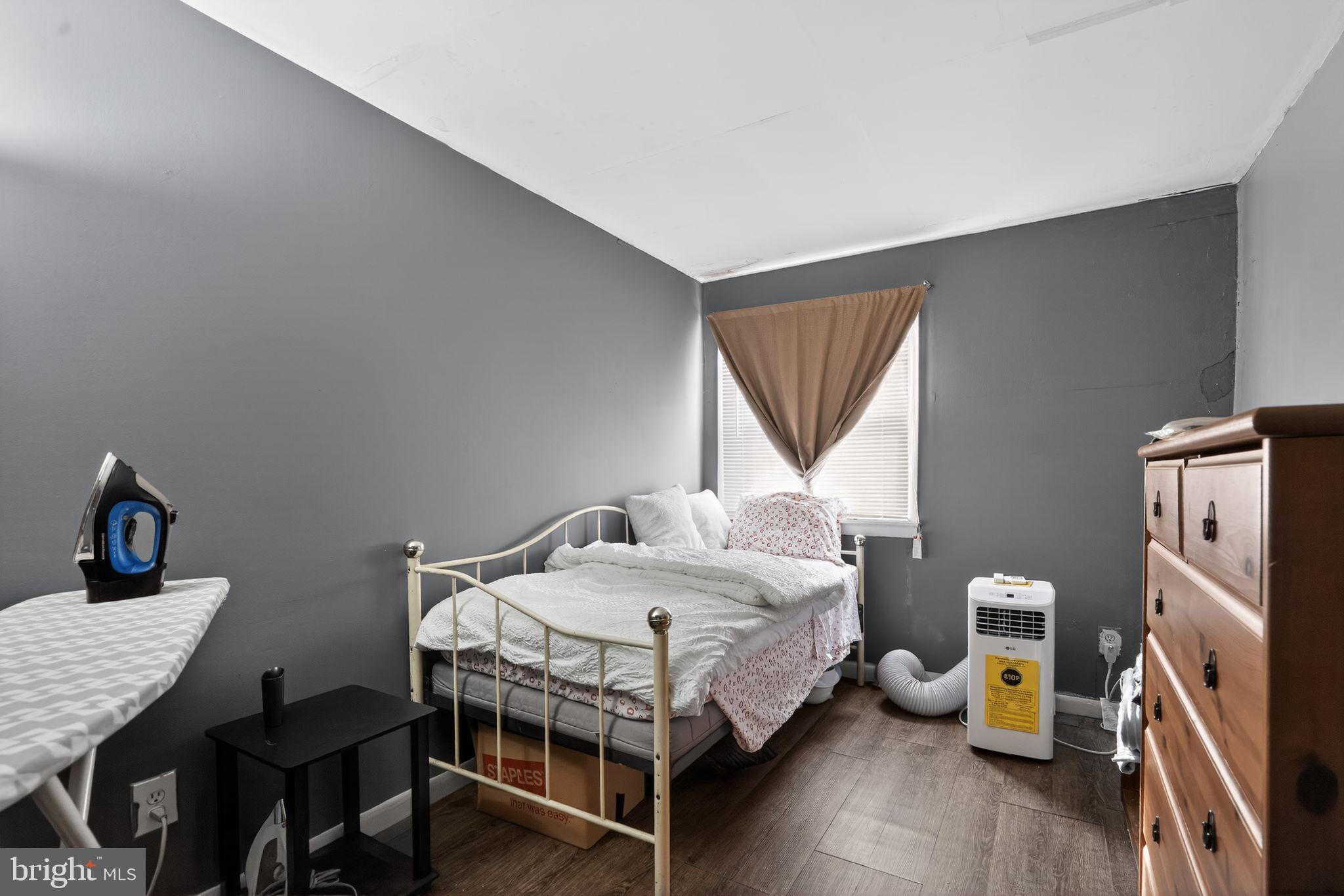 4026 Gideon Road Brookhaven, PA 19015 - Photo 9 of 28 a bedroom with a bed and a table