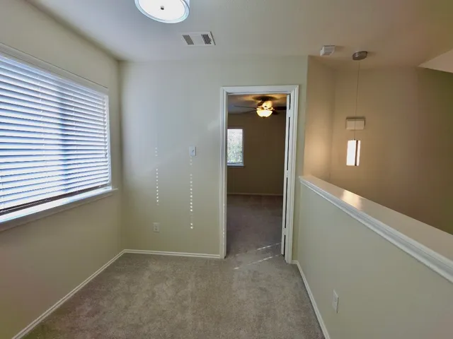 an empty room that has a window