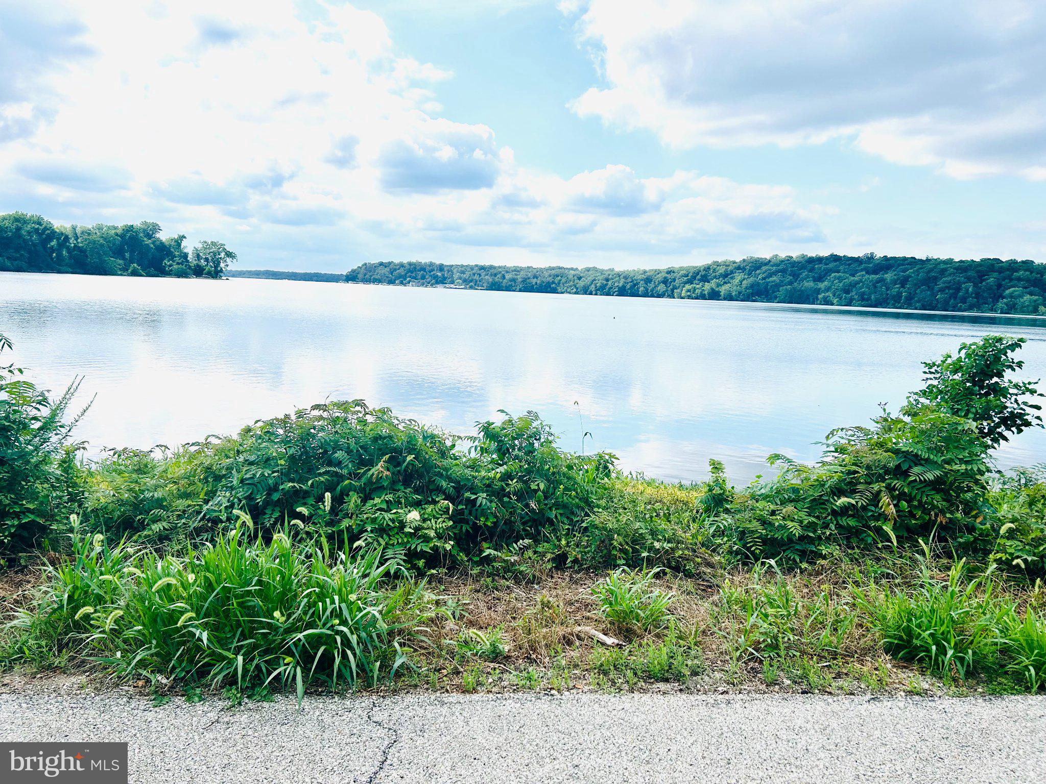 14500 Leonard Calvert Drive Accokeek, MD 20607 - Photo 11 of 18 Serene waters reflect the sky.