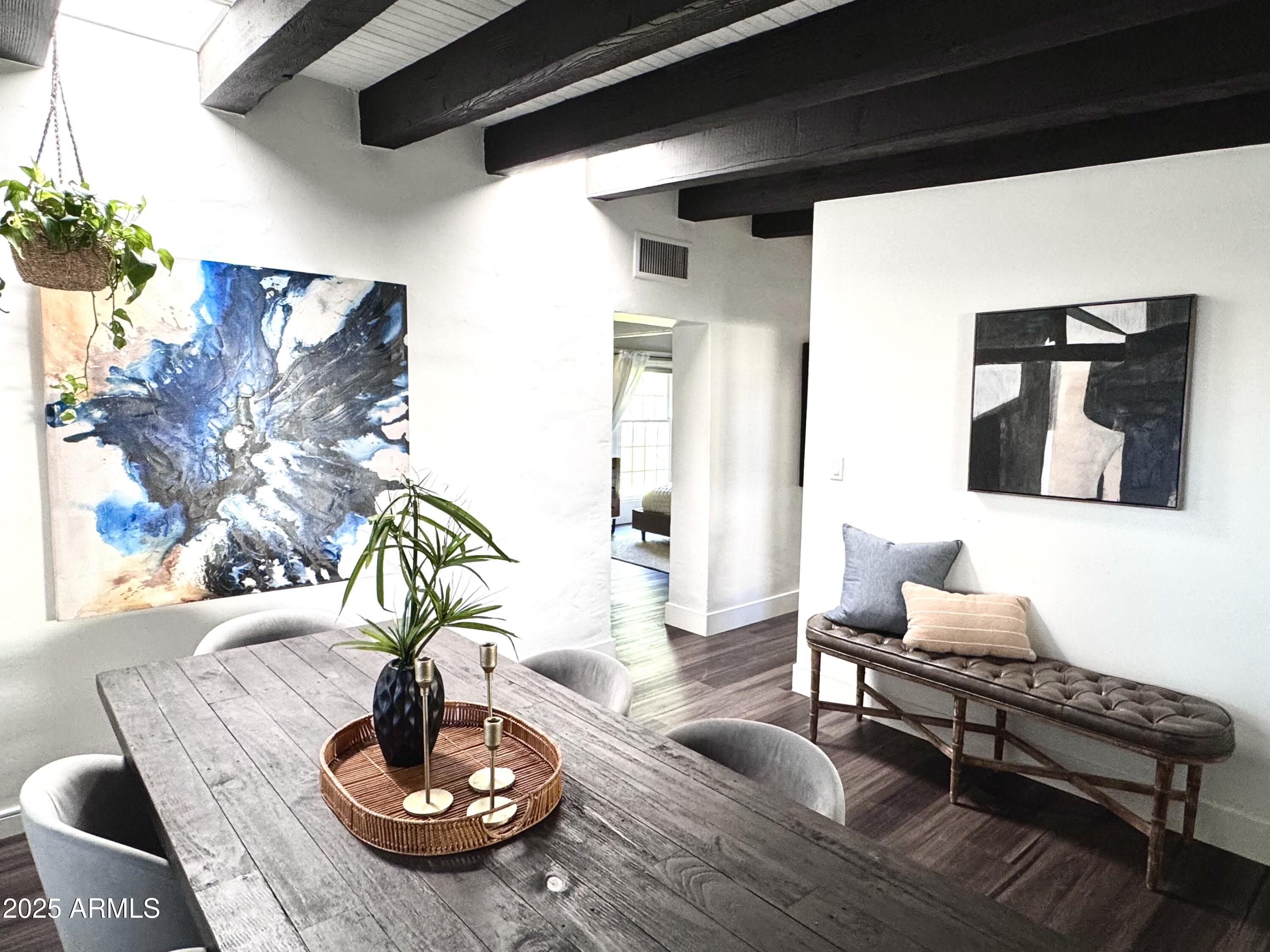 3134 North 28th Street Phoenix, AZ 85016 - Photo 11 of 21 a living room with furniture and wooden floor