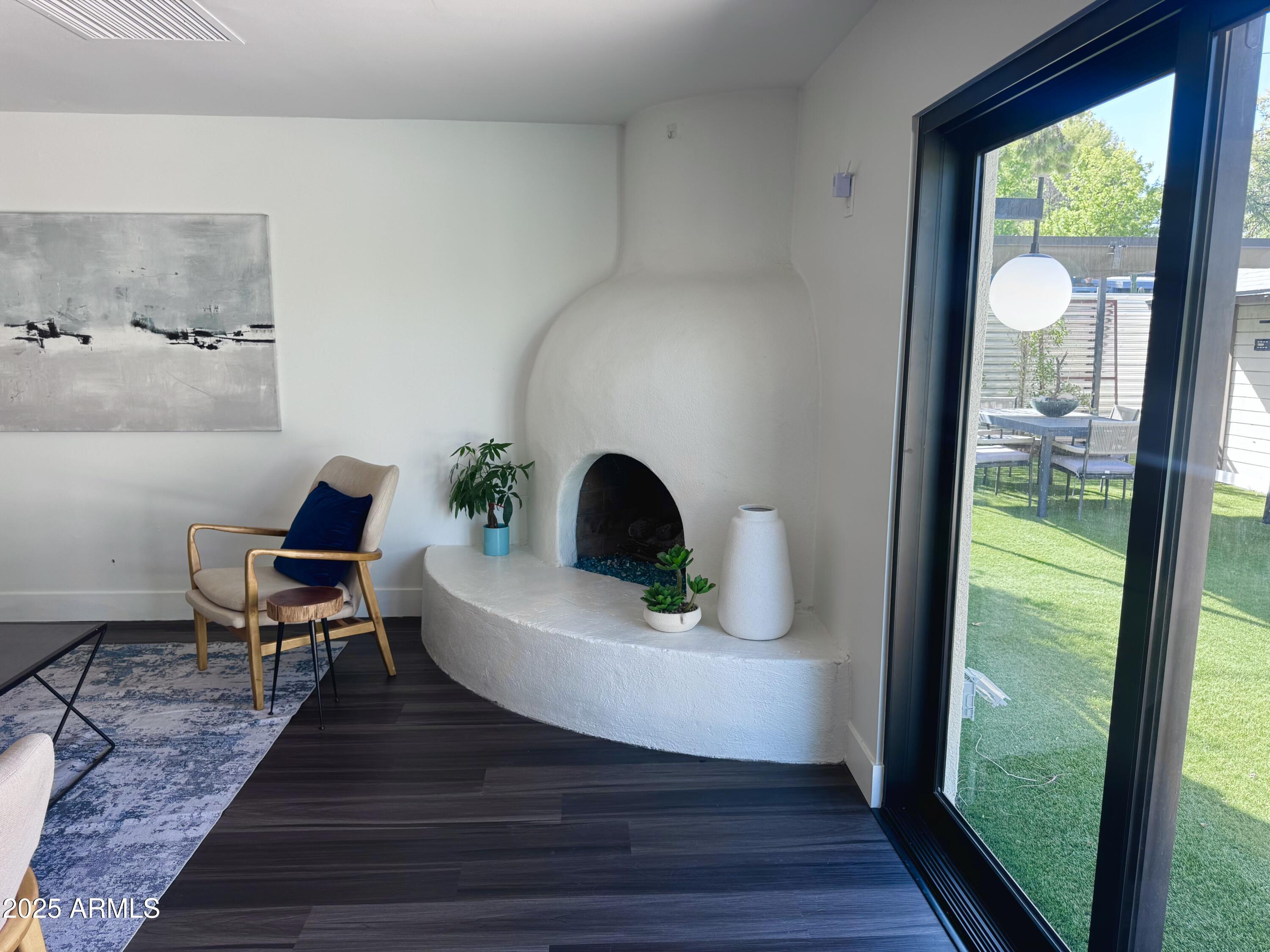 3134 North 28th Street Phoenix, AZ 85016 - Photo 7 of 21 a view of living room with furniture and a potted plant