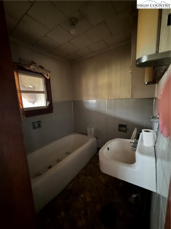 1630 Pleasant Ridge Road State Road, NC 28676 - Photo 15 of 17 a bathroom with a toilet sink and mirror