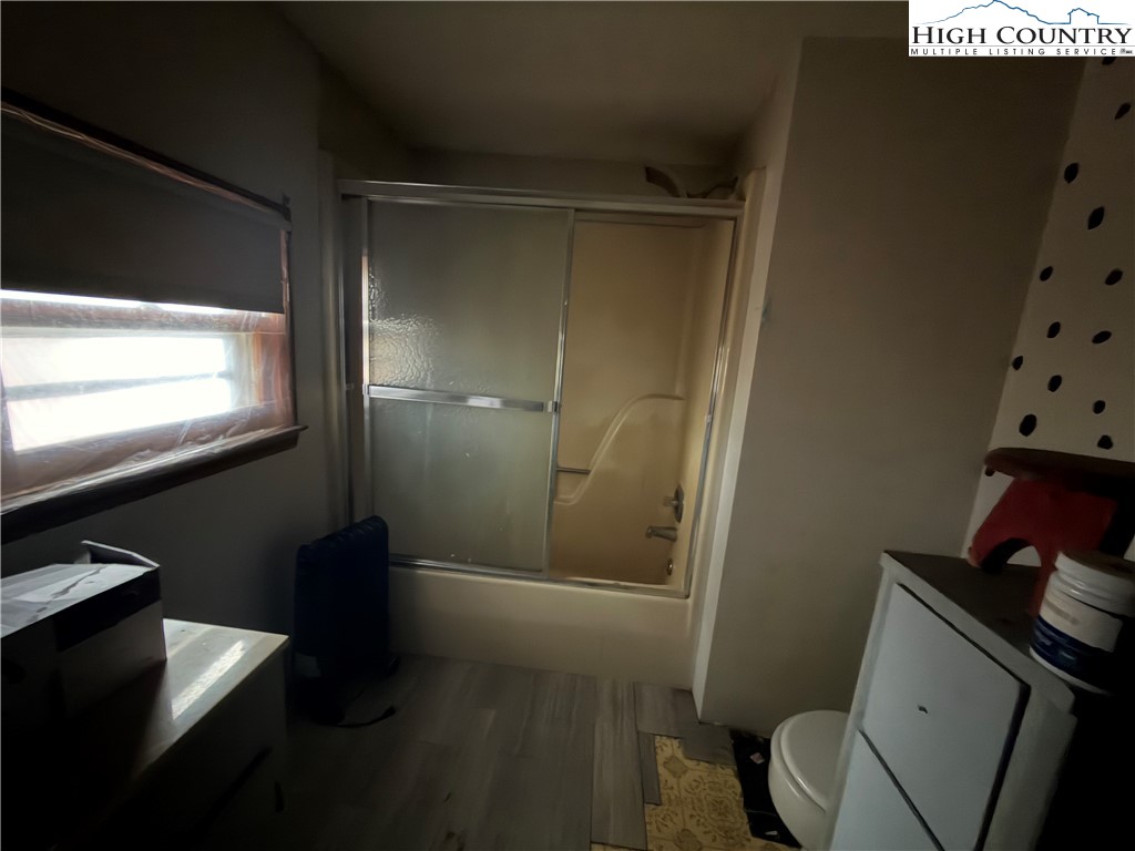 1630 Pleasant Ridge Road State Road, NC 28676 - Photo 16 of 17 a bathroom with a sink and a mirror