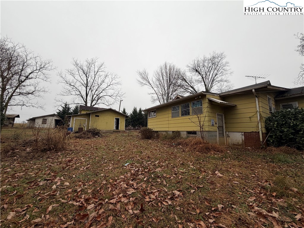 1630 Pleasant Ridge Road State Road, NC 28676 - Photo 3 of 17 a house that has a lot of windows in it