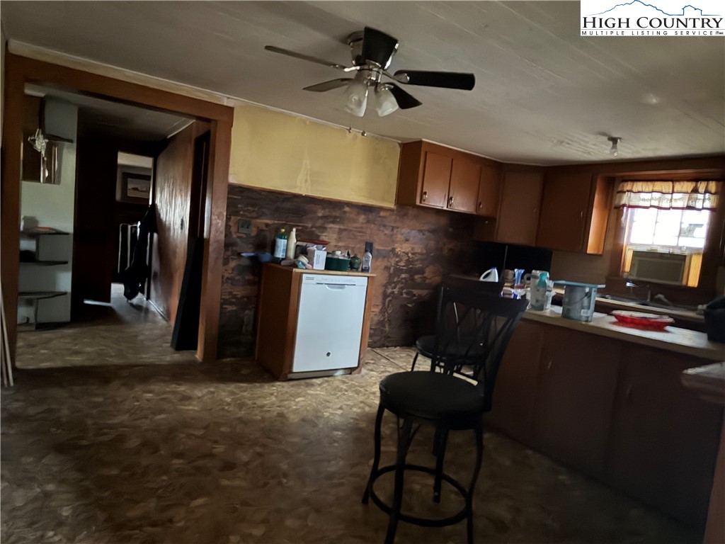 1630 Pleasant Ridge Road State Road, NC 28676 - Photo 8 of 17 a kitchen with refrigerator and window
