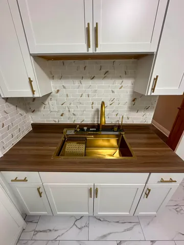 a close view of sink and stove